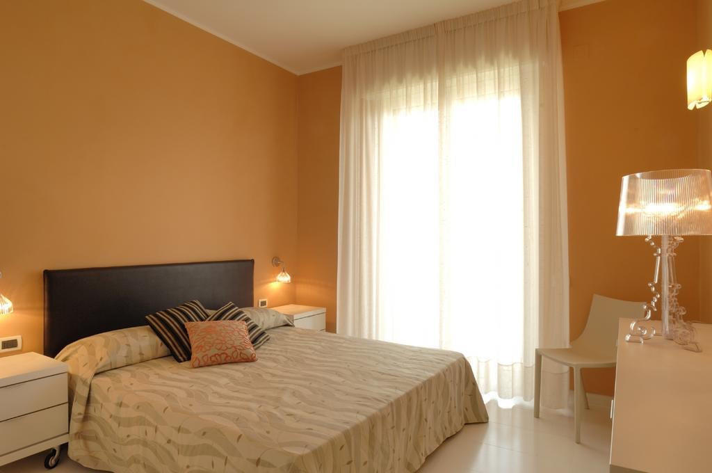 Residence Oliveto Ceriale Pokoj fotografie