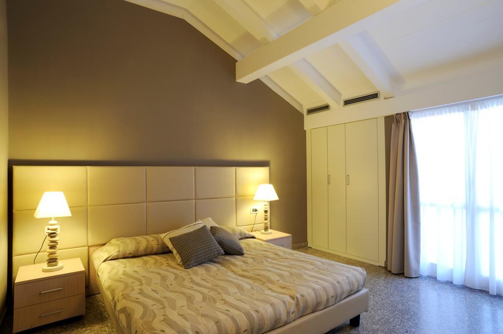 Residence Oliveto Ceriale Pokoj fotografie