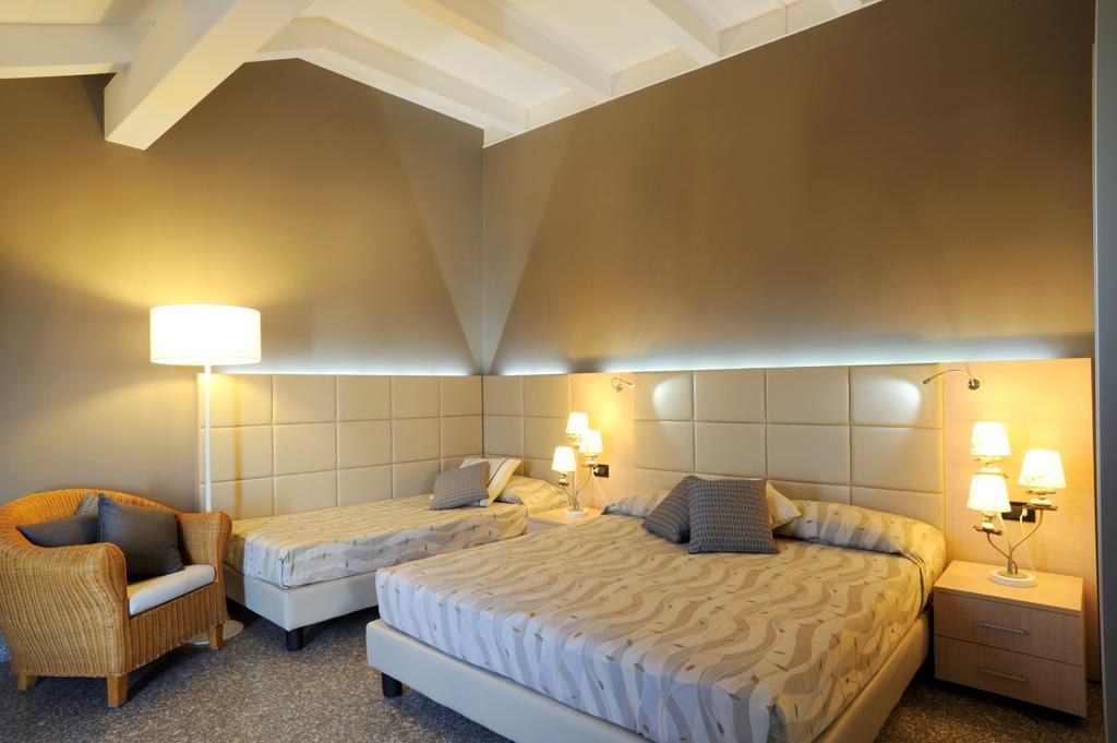 Residence Oliveto Ceriale Pokoj fotografie